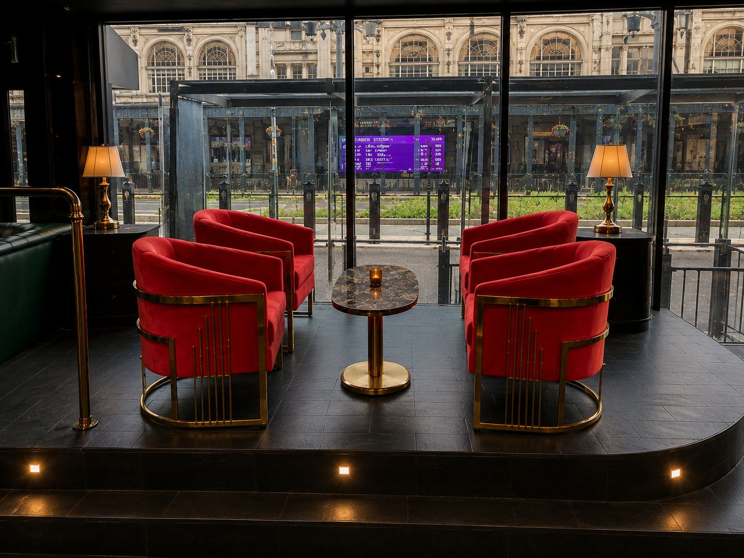 The front room: red velvet chairs at the window on Main Street